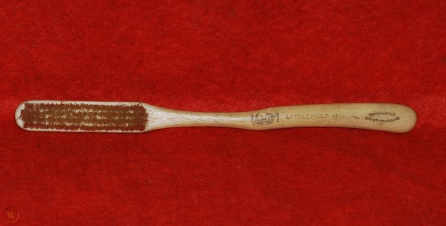 Kristin Holt | Old West: Toothbrushes and Toothpaste. Photograph of antique: 19th century toothbrush for sale by worthpoint.com. Made of bovine bone and boar bristle, carved to conform to the grip. 6.5-inches in length, this tooth brush was manufactured in France for export to the American Market. (Info and photo: worthpoint.com)
