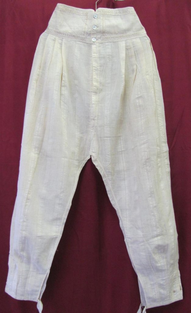 Kristin Holt | Victorian Ladies Underwear. Photo of "antique 19th century Victorian Era ladies long cotton kenar underpants with mother of pearl buttons... Length 44-inches; waist 14-inches." Sold on invaluable.com.