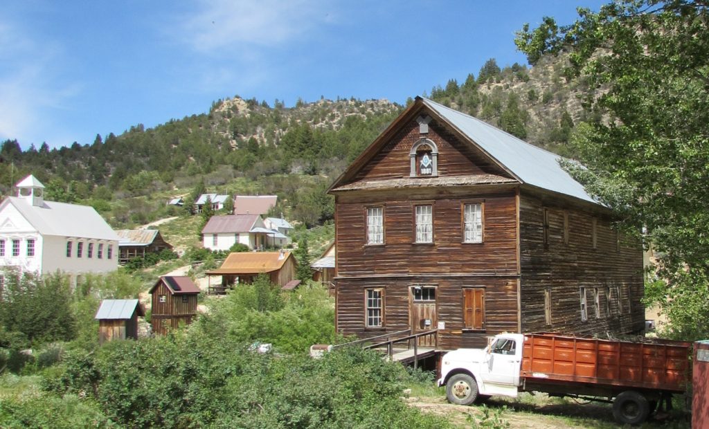 Kristin Holt | Historic Silver City, Idaho. Photo: Silver City historic school (white, on the left) and Masonic Lodge (brown, on the right). Image: 2016, taken by Kristin Holt.