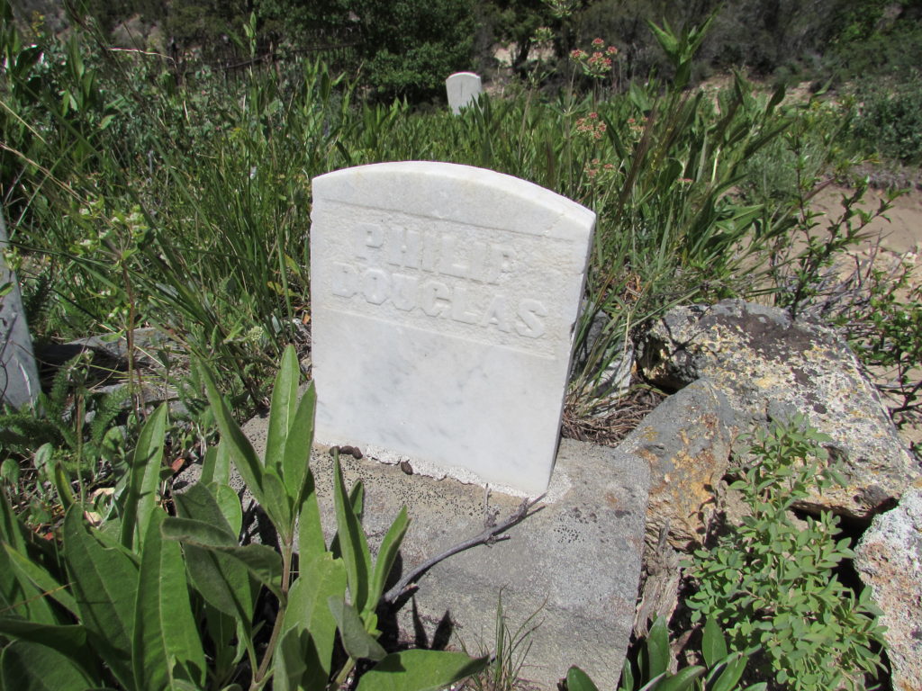 Kristin Holt | Silver City, Idaho's Ghost Town Cemetery. Some markers provide little information. This one, for Philip Douglas, gives only his name. Image: Kristin Holt, June 2016.