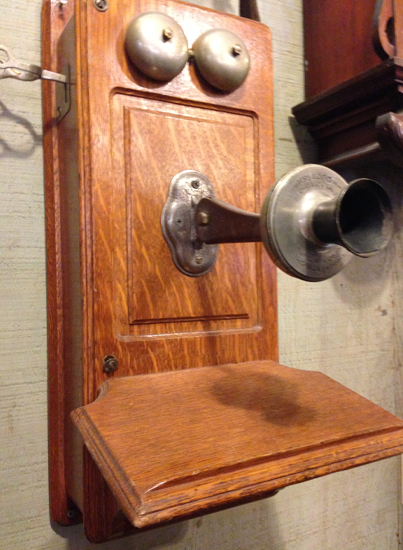 Kristin Holt | Victorian phone box with receiver and bells visible. Snapshot taken in a museum by Kristin Holt.