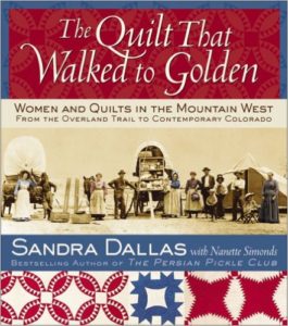 Kristin Holt | Pioneers' Yellow Roses: blooming on the Cartwright kitchen steps. Image of cover art: The Quilt That Walked to Golden: Women and the Quilts in the Mountain West from the Overland Trail to Contemporary Colorado.