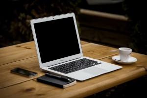 Kristin Holt | My Writing Process, Part 1. Office stock photo: laptop on table.