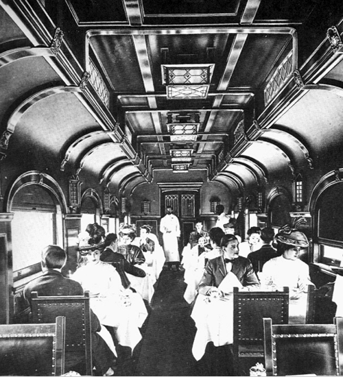 Kristin Holt | Luxury Travel 1890-Style. Vintage photograph of Pullman Dining Car. Passengers traveling in Sleeper Cars walked through the vestibule passageways from car to car to dine. Image: Public Domain.