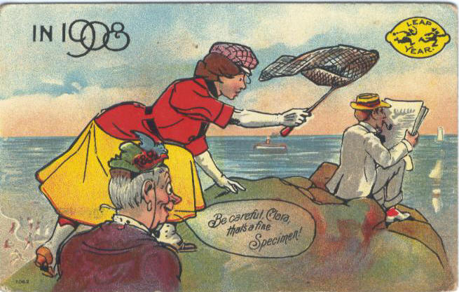 Kristin Holt | Victorian Leap Year Traditions Part 2. 1908 postcard: Humorous illustration wherein a woman creeps upon a man, unaware. She carries a butterfly net. An elderly woman says, "Be careful, Calra, that's a fine Specimen!" Image: Wikimedia Commons, Public Domain.PostcardLeapYearBeCarefulClara1908. Public Domain. Wikimedia Commons