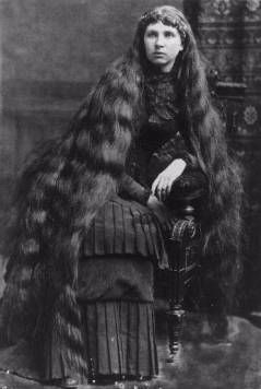 Kristin Holt | L-O-N-G Victorian Hair. Image of Victorian woman sitting, displaying long hair. Longhairloom.com and Pinterest.