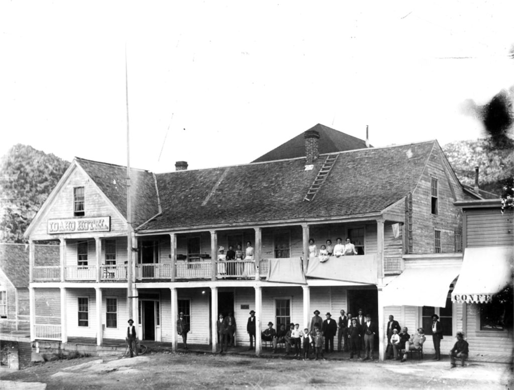 Kristin Holt | Historic Idaho Hotel in Silver City. Vinitage Photograph: Historic Idaho Hotel. Built in 1863 in Ruby City, on Jordan Creek (a mile below Silver City). in 1866, two-year-old Silver City became the county seat and many homes and buildings were moved to Silver City. The Idaho Hotel was dismantled, laoded onto sleds and skids and pulled up the snow- and ice-covered road to a new location in Silver City. A three-story addition was added at the same time. [text source: Images of America: Owyhee County, by Robert L. Deen, p 29]