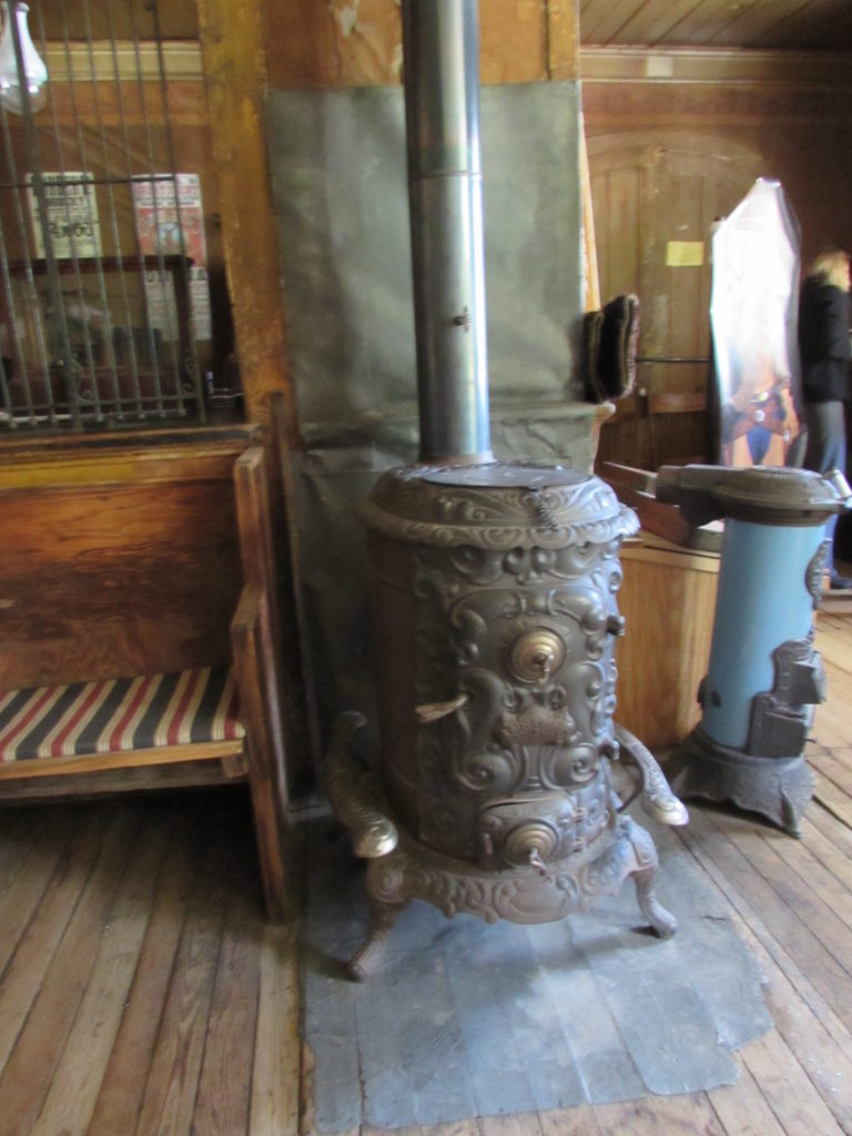 Kristin Holt | Historic Idaho Hotel in Silver City. Stove (wood or coal?) in the lobby of historic Idaho Hotel, Silver City, Idaho. Image: taken 2016 by Kristin Holt.
