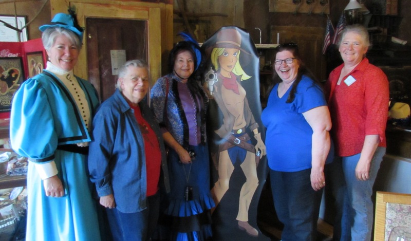 Authors: Kristin Holt, Judith Laik, Charlene Raddon, (Honey--Jacquie's character), Jacquie Rogers, and Paty Jager, together in the lobby of the historic Idaho Hotel.