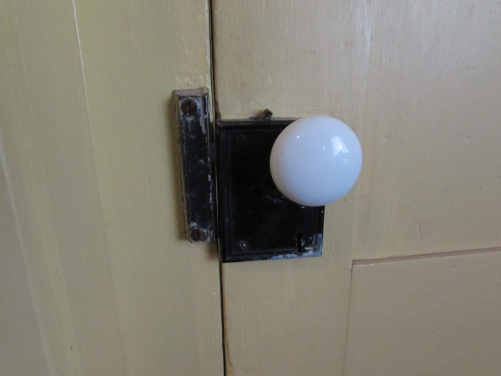 Kristin Holt | Historic Idaho Hotel in Silver City. Antique hardware (doorknobs and locks). This one was the inside of a guest room on the 2nd floor, Historic Idaho Hotel, Silver City, Idaho.