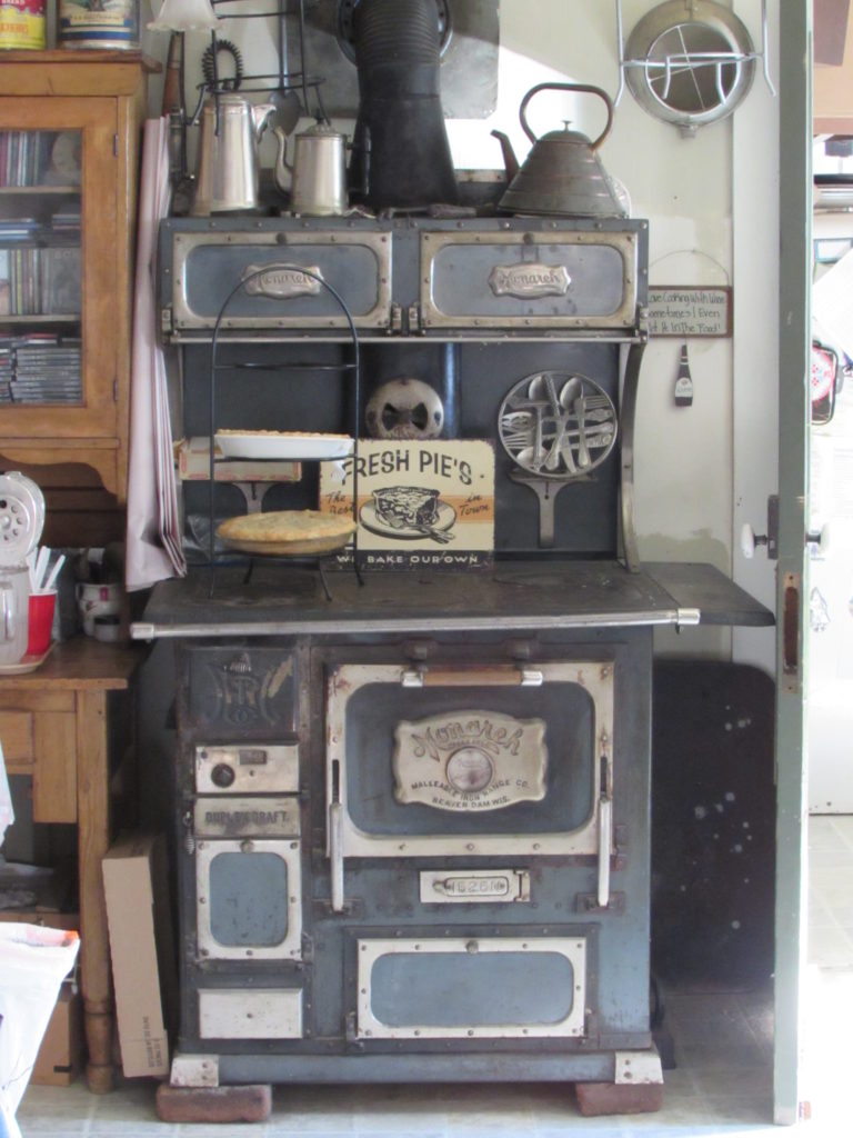 Kristin Holt | Historic Idaho Hotel in Silver City. Antique kitchen range visible from the Silver City historic Idaho Hotel's dining room/bar. Fresh pie is displayed on the cooking surface. The homemade pies are to die for!