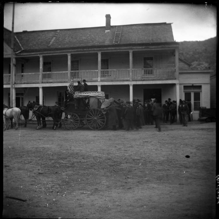 Kristin Holt | Historic Silver City, Idaho. Vintage photograph: Troops Leaving Silver City for Sampson's fleet. Photographed in front of Idaho Hotel, 1898. Image courtesy of Idaho State Archives, Idaho State Historical Society. P1960-139-24, Idaho State Archives.