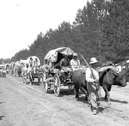 Kristin Holt | Pioneer Day: Utah's Victorian History. Re-enactment of Mormon pioneers in the 1912 Pioneer Day Parade at Liberty Park, Salt Lake City, Utah. Photographer Shipler Commercial Photographers; Shipler, Harry Commercial photo taken on assignment, published circa 1912. [Image: Public Domain, courtesy of Wikipedia]