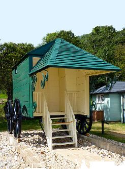 Kristin Holt | Victorians at the Seashore. Modern photograph of Queen Victoria's Bathing Machine, via Pinterest.