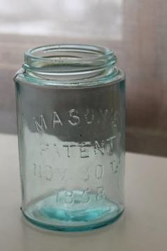 Kristin Holt | Old West Mason Jars. Photo of an 1858 Mason Patent Bottle. Aqua-marine in color. Image: Pinterest.
