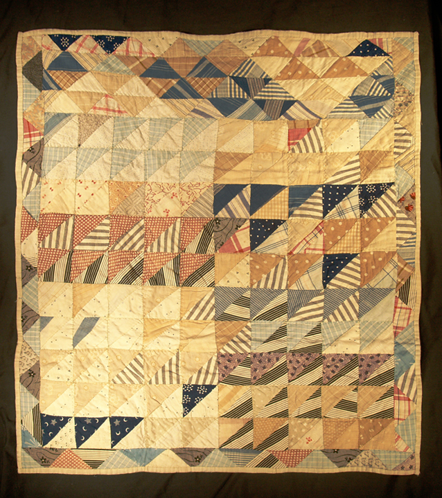 Kristin Holt | Pleasance's Flying Geese. Antique Geese in Flight, triangle-border bassinette-sized quilt, circa 1880. Made in New England. For sale by Rocky Mountain Quilts.