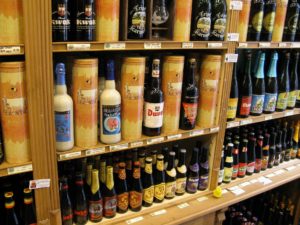 Kristin Holt | Victorian Americans Celebrate Oktoberfest. Photograph: A store's shelf containing a variety of alcoholic beverages.