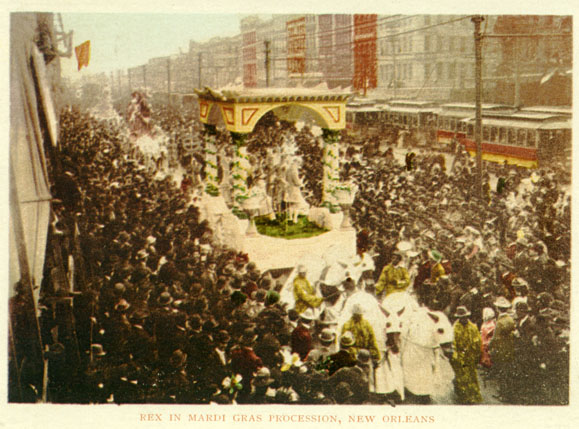 Kristin Holt | Victorian Americans and Mardi Gras. Rex in procession down Canal Street; postcard from around 1900. Image: Wikipedia, Public Domain.