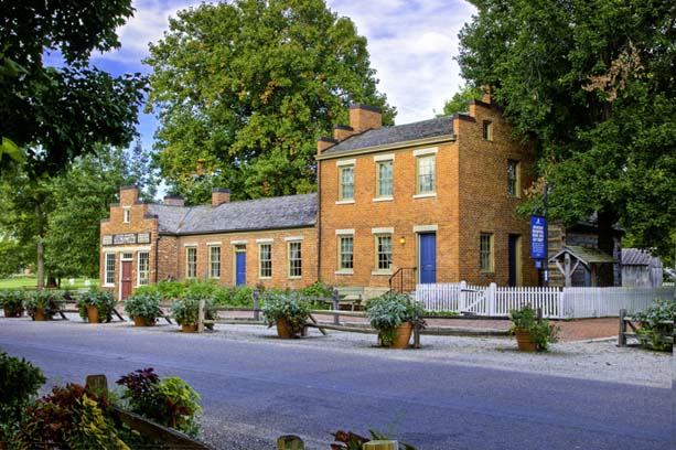 Kristin Holt | Famous Nineteenth Century Gunsmiths. Photo of Jonathan Browning home and gunsmith shop in Old Nauvoo, Illinois.