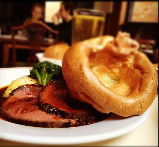 Kristin Holt | Victorian Fare: Yorkshire Pudding. Image of Yorkshire Pudding served with a roast beef dinner. Image courtesy of Pinterest.