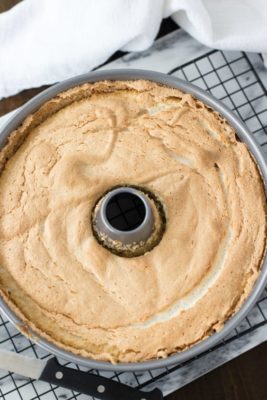 Kristin Holt | photograph of a modern angel food cake in a tube pan. Related to Victorian Baking: Angel's Food Cake. 