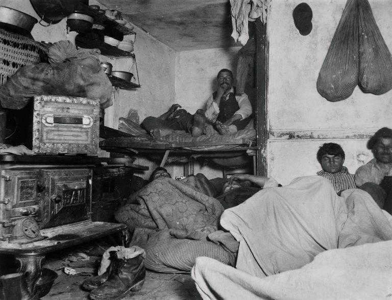 Ladies Fashions: Huge Sleeves of the 1890s. "Lodgers in a Crowded Bayard Street Tenement--5 cents a spot," photograph by Jacob Riis, 1888, published in 1890 within How The Other Half Lives. Image: Wikipedia, Public Domain.