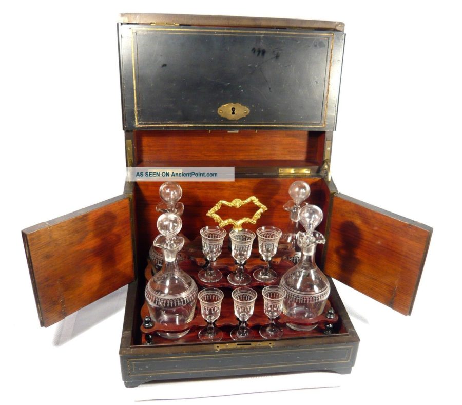 Kristin Holt | Cocaine in Victorian Dentistry. Photograph of antique Victorian liqueur case (liquor box, tantalus, decanter and cordial glasses). Photo courtesy of AncientPoint.com.
