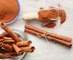 Kristin Holt | Cinnamon powder and stick, image copyright Freepik, used with premium subscription.