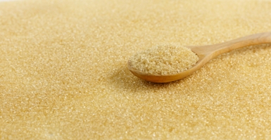 Kristin Holt | Spoon of brown sugar, image copyright Freepik, used with premium subscription.