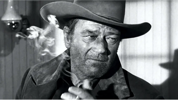 Kristin Holt | Victorian Tobacco: Cures or Kills? Photograph of John Wayne, smoking. Courtesy of My Favorite Westerns.